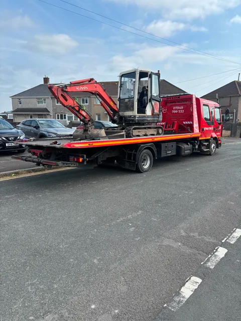 Kubota mini digger recovered on the flatbed truck
